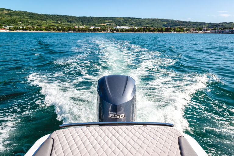 This is an image of the stern of a 25 cabin outboard boat